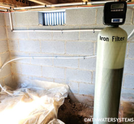 Iron Filter Install in Candler Crawlspace