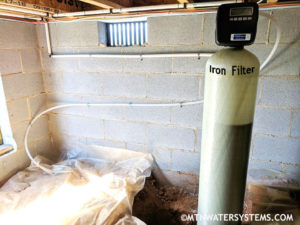 Iron Filter Install in Candler Crawlspace